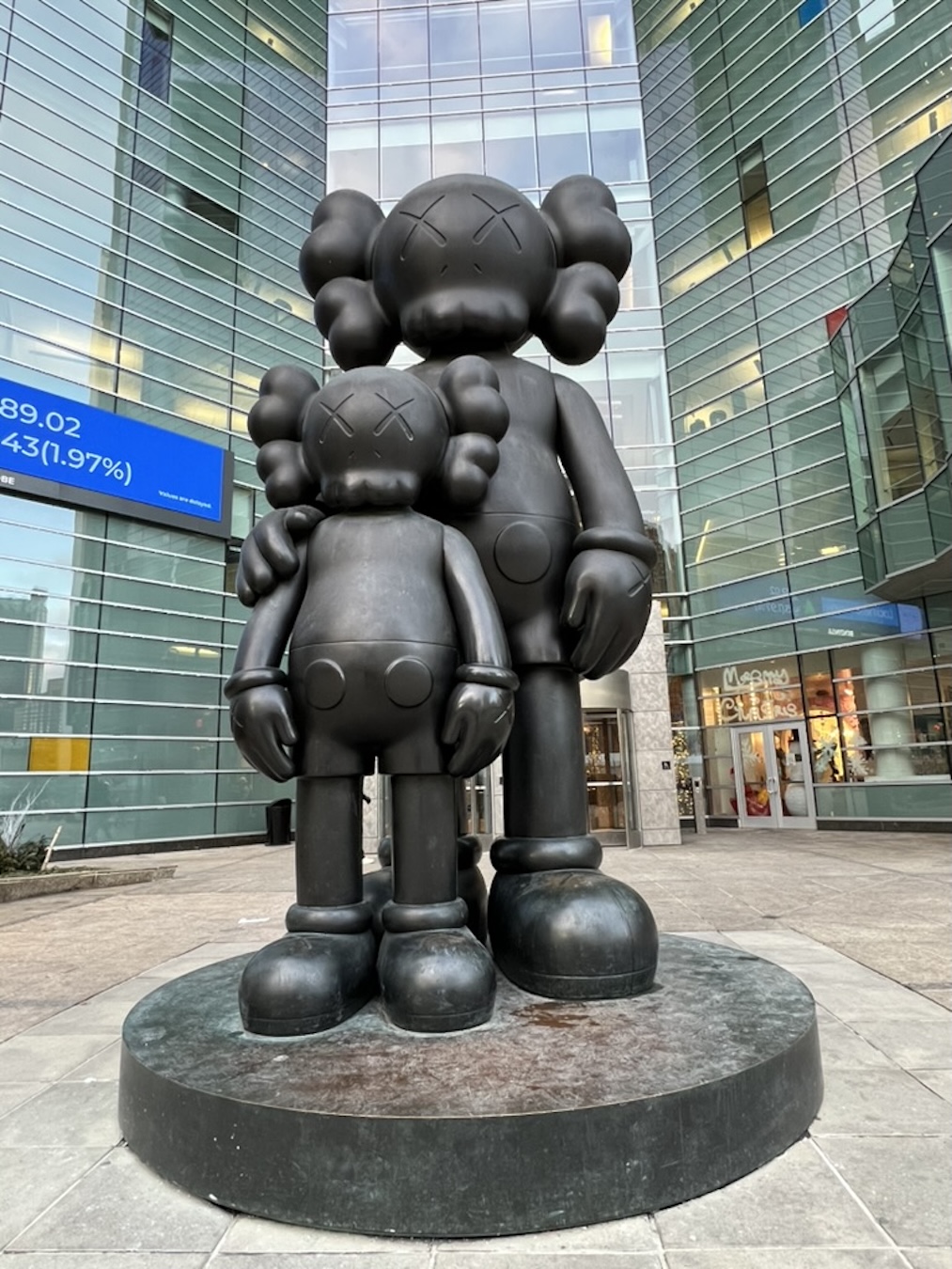 Statue Instalation called 'Waiting' by artist KAWS